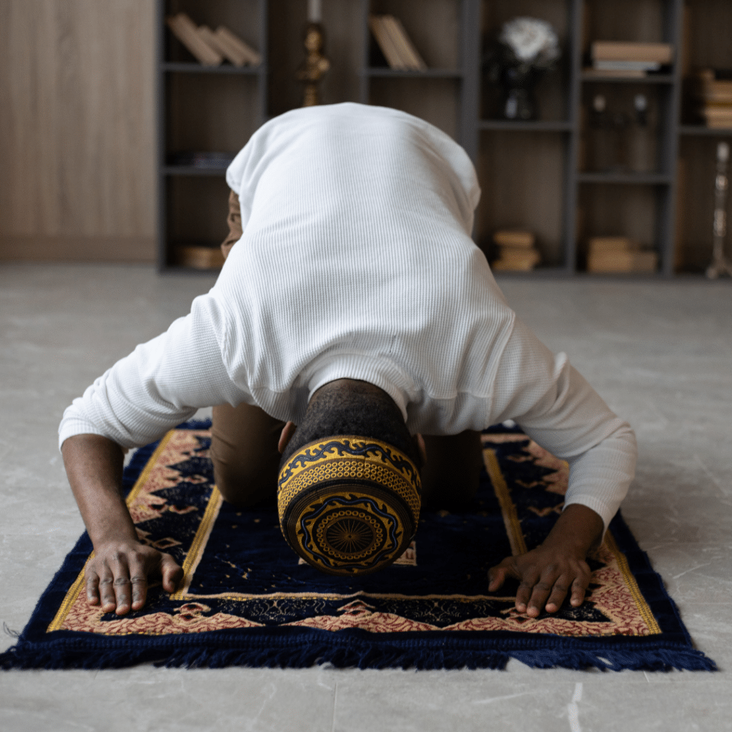 a muslim man praying